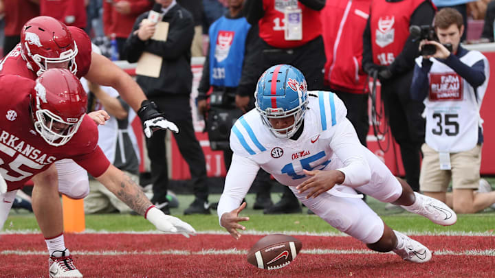 Nov 2, 2024; Fayetteville, Arkansas, USA; Ole Miss Rebels defensive end Jared Ivey (15) falls on a loose ball in the end zone for a touchdown in the first quarter against the Arkansas Razorbacks at Donald W. Reynolds Razorback Stadium. Mandatory Credit: Nelson Chenault-Imagn Images Nov 2, 2024; Fayetteville, Arkansas, USA; Ole Miss Rebels defensive end Jared Ivey (15) falls on a loose ball in the end zone for a touchdown in the first quarter against the Arkansas Razorbacks at Donald W. Reynolds Razorback Stadium. Mandatory Credit: Nelson Chenault-Imagn Images