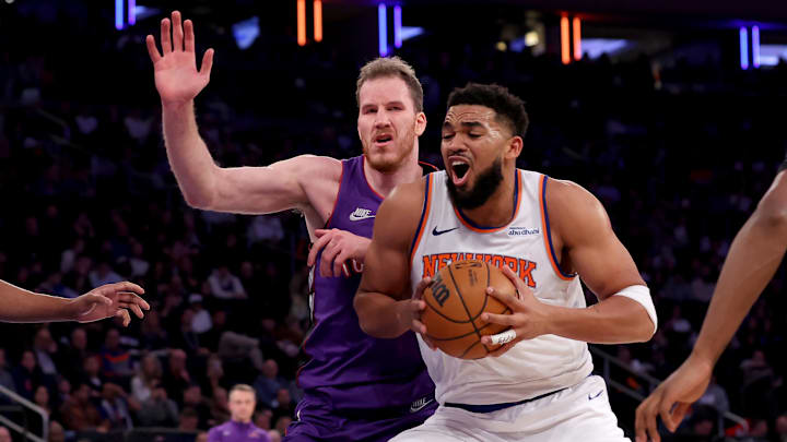 Jan 8, 2025; New York, New York, USA; New York Knicks center Karl-Anthony Towns (32) drives to the basket against Toronto Raptors center Jakob Poeltl (19) during the third quarter at Madison Square Garden. Mandatory Credit: Brad Penner-Imagn Images Jan 8, 2025; New York, New York, USA; New York Knicks center Karl-Anthony Towns (32) drives to the basket against Toronto Raptors center Jakob Poeltl (19) during the third quarter at Madison Square Garden. Mandatory Credit: Brad Penner-Imagn Images