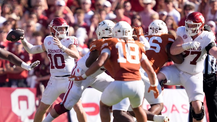 Oklahoma Sooners quarterback John Mateer (10) throws a pass in the first half of the Red River Rivalry college football game between the University of Oklahoma Sooners and the Texas Longhorn at the Cotton Bowl Stadium in Dallas, Texas, Saturday, Oct. 11, 2025.