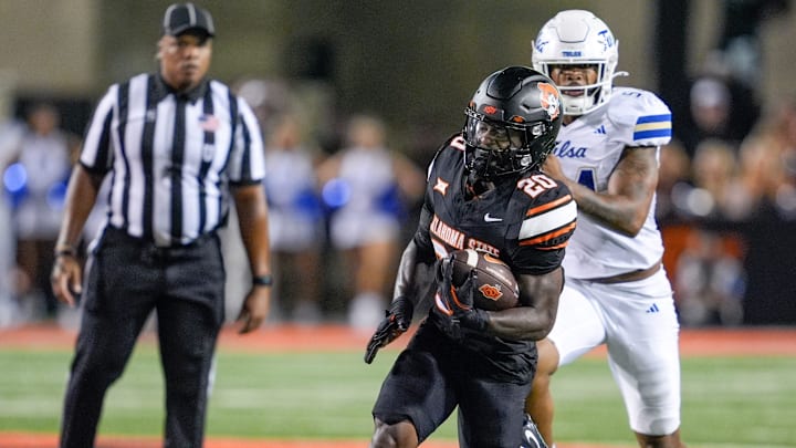 Oklahoma State running back Rodney Fields Jr. (20) runs the ball in the third quarter during an NCAA football game between Oklahoma State (OSU) and Tulsa at Boone Pickens Stadium in Stillwater, Okla., on Friday, Sept. 19, 2025.