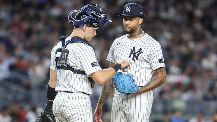 Aug 21, 2025; Bronx, New York, USA;  New York Yankees starting pitcher Luis Gil (81) talks with catcher Ben Rice (22) after loading the bases in the fifth inning against the Boston Red Sox at Yankee Stadium. Mandatory Credit: Wendell Cruz-Imagn Images