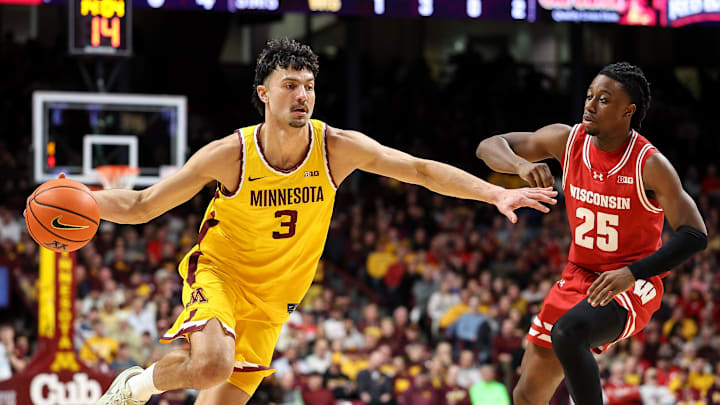 Mar 5, 2025; Minneapolis, Minnesota, USA; Minnesota Golden Gophers forward Dawson Garcia (3) works around Wisconsin Badgers guard John Blackwell (25) during the first half at Williams Arena. Mandatory Credit: Matt Krohn-Imagn Images