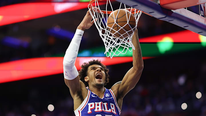 Oct 25, 2025; Philadelphia, Pennsylvania, USA; Philadelphia 76ers forward Dominick Barlow (25) dunks the ball against the Charlotte Hornets during the first quarter at Xfinity Mobile Arena. Mandatory Credit: Bill Streicher-Imagn Images