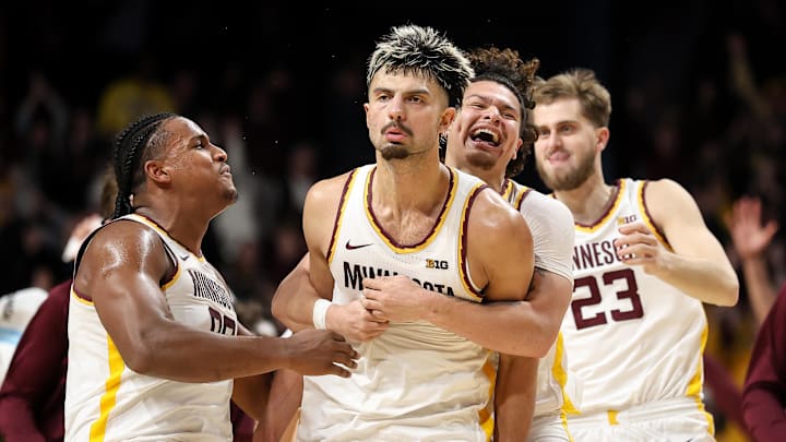 Jan 16, 2025; Minneapolis, Minnesota, USA; Minnesota Golden Gophers forward Dawson Garcia (3) celebrates his game winning three-point basket against the Michigan Wolverines after the game at Williams Arena. Mandatory Credit: Matt Krohn-Imagn Images