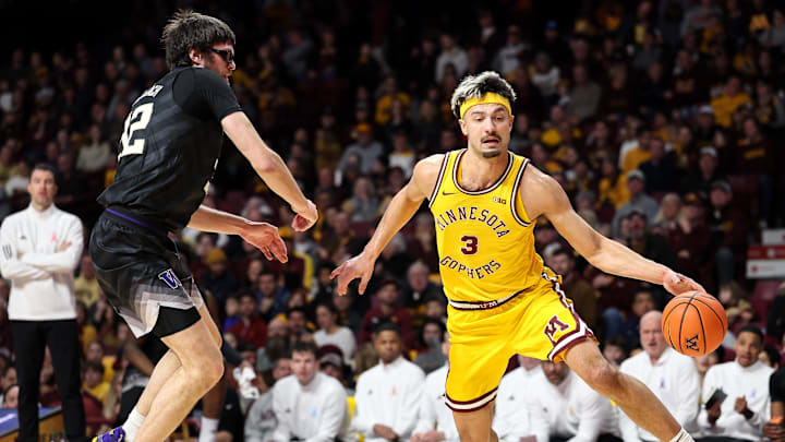 Feb 1, 2025; Minneapolis, Minnesota, USA; Minnesota Golden Gophers forward Dawson Garcia (3) works around Washington Huskies forward Wilhelm Breidenbach (32) defends during the first half at Williams Arena. Mandatory Credit: Matt Krohn-Imagn Images Feb 1, 2025; Minneapolis, Minnesota, USA; Minnesota Golden Gophers forward Dawson Garcia (3) works around Washington Huskies forward Wilhelm Breidenbach (32) defends during the first half at Williams Arena. Mandatory Credit: Matt Krohn-Imagn Images