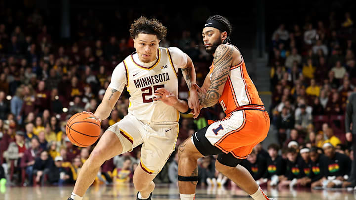 Feb 8, 2025; Minneapolis, Minnesota, USA; Minnesota Golden Gophers guard Lu'Cye Patterson (25) works around Illinois Fighting Illini guard Kylan Boswell (4) during the first half at Williams Arena. Mandatory Credit: Matt Krohn-Imagn Images Feb 8, 2025; Minneapolis, Minnesota, USA; Minnesota Golden Gophers guard Lu'Cye Patterson (25) works around Illinois Fighting Illini guard Kylan Boswell (4) during the first half at Williams Arena. Mandatory Credit: Matt Krohn-Imagn Images