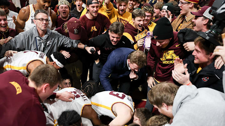 Jan 16, 2025; Minneapolis, Minnesota, USA; Minnesota Golden Gophers players and fans celebrate the teams win after the game against the Michigan Wolverines at Williams Arena. Mandatory Credit: Matt Krohn-Imagn Images Jan 16, 2025; Minneapolis, Minnesota, USA; Minnesota Golden Gophers players and fans celebrate the teams win after the game against the Michigan Wolverines at Williams Arena. Mandatory Credit: Matt Krohn-Imagn Images
