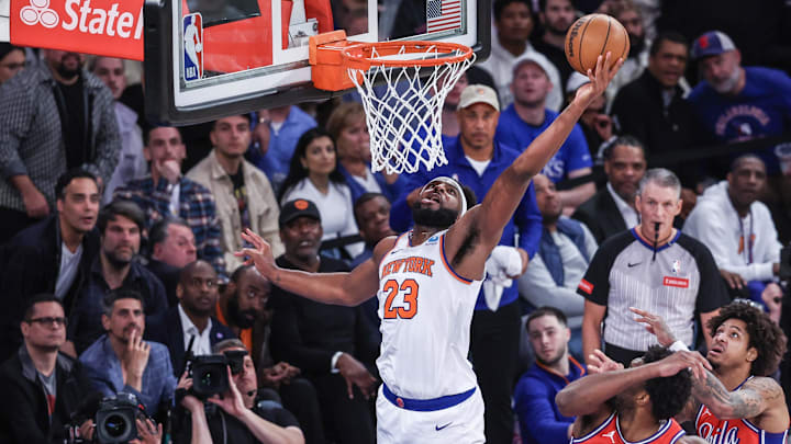 Apr 20, 2024; New York, New York, USA; New York Knicks center Mitchell Robinson (23) goes up for a rebound in the fourth quarter against the Philadelphia 76ers in game one of the first round for the 2024 NBA playoffs at Madison Square Garden. Mandatory Credit: Wendell Cruz-Imagn Images