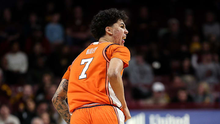 Feb 8, 2025; Minneapolis, Minnesota, USA; Illinois Fighting Illini forward Will Riley (7) celebrates his 3-point basket against the Minnesota Golden Gophers during the second half at Williams Arena. Mandatory Credit: Matt Krohn-Imagn Images