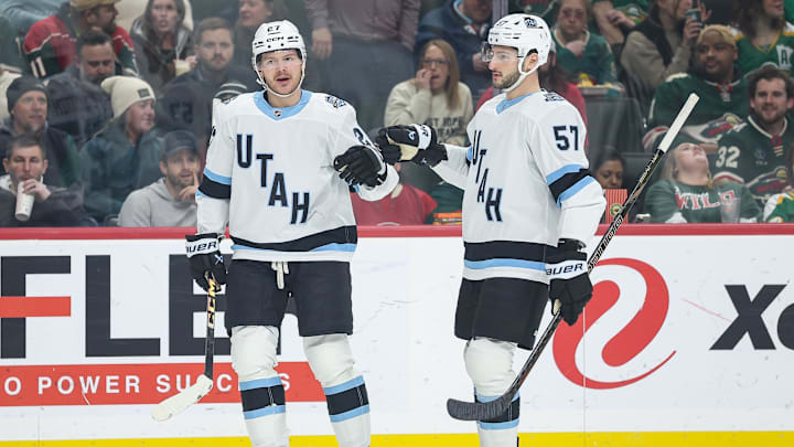 Utah Hockey Club center Barrett Hayton celebrates a goal.
