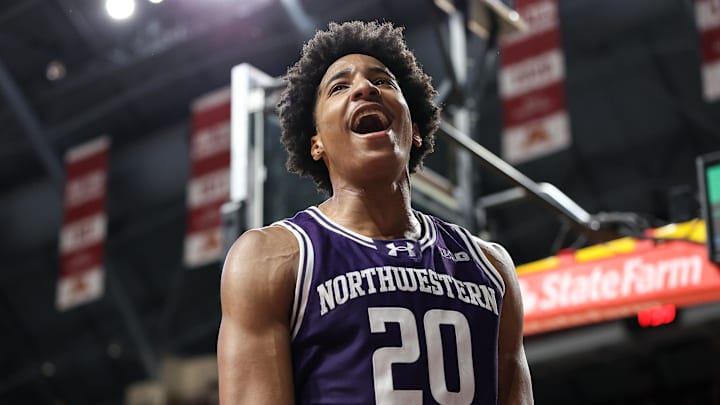Feb 25, 2025; Minneapolis, Minnesota, USA; Northwestern Wildcats guard Justin Mullins (20) celebrates his basket against the Minnesota Golden Gophers during the second half at Williams Arena. Mandatory Credit: Matt Krohn-Imagn Images