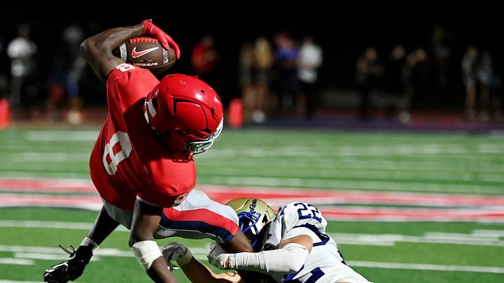 Brentwood's Turner Weber (22) upends Brentwood Academy's Braylen Bedford (8) during a TSSAA high school football game at Brentwood Academy on Friday, Aug. 28, 2026, in Brentwood, Tenn. Brentwood's Turner Weber (22) upends Brentwood Academy's Braylen Bedford (8) during a TSSAA high school football game at Brentwood Academy on Friday, Aug. 28, 2026, in Brentwood, Tenn.