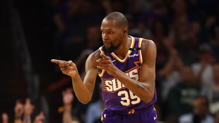 Mar 24, 2025; Phoenix, Arizona, USA; Phoenix Suns forward Kevin Durant (35) reacts against the Milwaukee Bucks at Footprint Center. Mandatory Credit: Mark J. Rebilas-Imagn Images