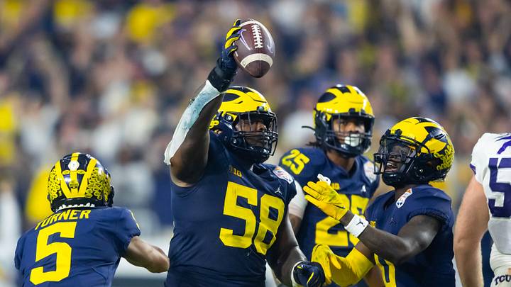 Dec 31, 2022; Glendale, Arizona, USA; Michigan Wolverines defensive lineman Mazi Smith (58) celebrates a play against the TCU Horned Frogs in the 2022 Fiesta Bowl at State Farm Stadium. Mandatory Credit: Mark J. Rebilas-USA TODAY Sports Dec 31, 2022; Glendale, Arizona, USA; Michigan Wolverines defensive lineman Mazi Smith (58) celebrates a play against the TCU Horned Frogs in the 2022 Fiesta Bowl at State Farm Stadium. Mandatory Credit: Mark J. Rebilas-USA TODAY Sports