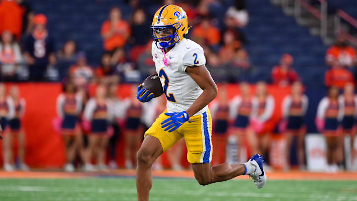 Oct 18, 2025; Syracuse, New York, USA; Pittsburgh Panthers wide receiver Kenny Johnson (2) runs with the ball against the Syracuse Orange during the second half at the JMA Wireless Dome. Mandatory Credit: Rich Barnes-Imagn Images Oct 18, 2025; Syracuse, New York, USA; Pittsburgh Panthers wide receiver Kenny Johnson (2) runs with the ball against the Syracuse Orange during the second half at the JMA Wireless Dome. Mandatory Credit: Rich Barnes-Imagn Images
