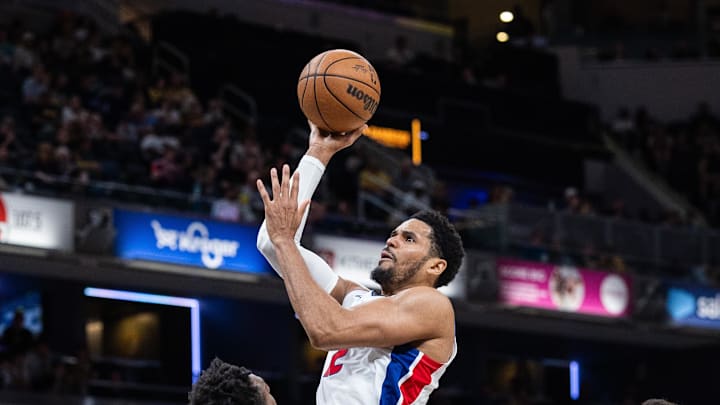 Apr 12, 2026; Indianapolis, Indiana, USA;  Detroit Pistons forward Tobias Harris (12) shoots the ball while Indiana Pacers guard Kobe Brown (24) defends in the second half at Gainbridge Fieldhouse. Mandatory Credit: Trevor Ruszkowski-Imagn Images