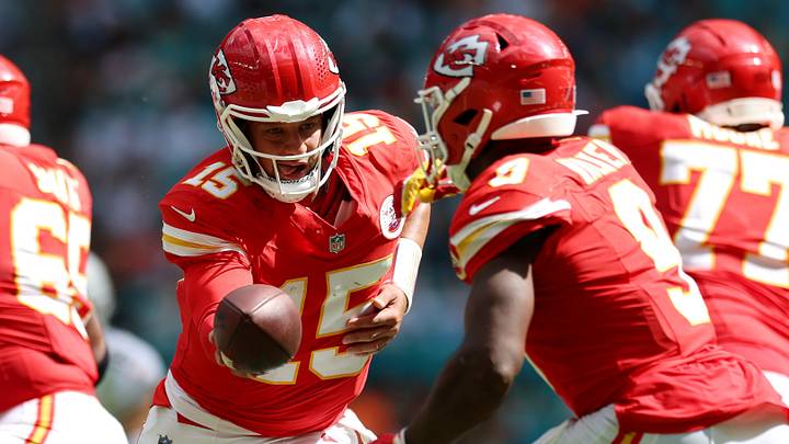Kansas City Chiefs quarterback Patrick Mahomes (15) and running back Kenneth Walker III (9) during game versus Miami Dolphins. Kansas City Chiefs quarterback Patrick Mahomes (15) and running back Kenneth Walker III (9) during game versus Miami Dolphins.