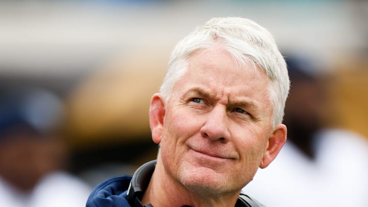 Tennessee Titans head coach Mike McCoy walks along the sideline during the first quarter