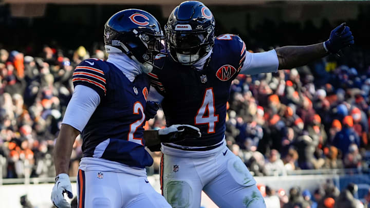 Dec 14, 2025; Chicago, Illinois, USA; Chicago Bears wide receiver DJ Moore (2) and Chicago Bears running back D'Andre Swift (4) celebrate after a touchdown during the third quarter against the Cleveland Browns at Soldier Field. Mandatory Credit: David Banks-Imagn Images Dec 14, 2025; Chicago, Illinois, USA; Chicago Bears wide receiver DJ Moore (2) and Chicago Bears running back D'Andre Swift (4) celebrate after a touchdown during the third quarter against the Cleveland Browns at Soldier Field. Mandatory Credit: David Banks-Imagn Images