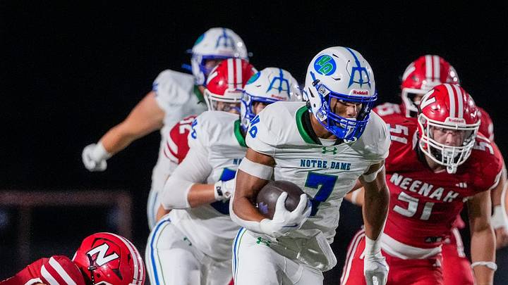 Green Bay Notre Dame's Kingston Allen (7) runs the ball against Neenah High School on Friday, Aug. 21, 2026, at Neenah High School in Neenah, Wisconsin. Notre Dame won the game in overtime, 56-53.
Tork Mason/Green Bay Press-Gazette Green Bay Notre Dame's Kingston Allen (7) runs the ball against Neenah High School on Friday, Aug. 21, 2026, at Neenah High School in Neenah, Wisconsin. Notre Dame won the game in overtime, 56-53.
Tork Mason/Green Bay Press-Gazette