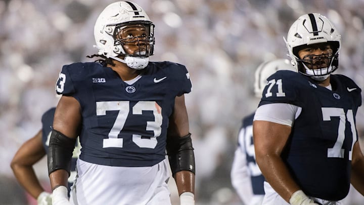 Penn State offensive lineman Caedan Wallace (73) prepares for a play during a White Out football