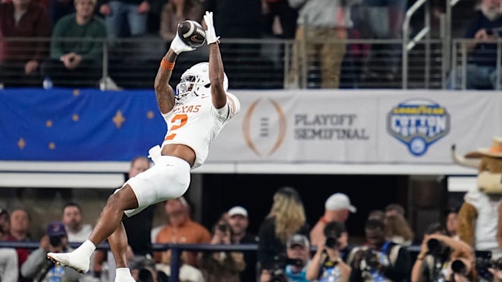 Texas Longhorns wide receiver Matthew Golden (2) catches a pass against Ohio State during the Cotton Bowl.