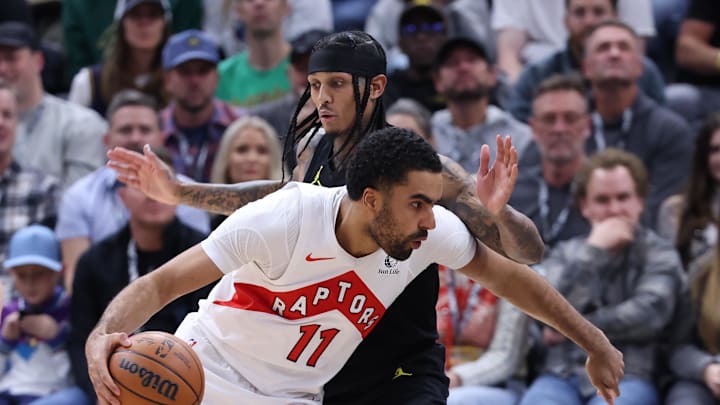 Jan 12, 2024; Salt Lake City, Utah, USA; Toronto Raptors center Jontay Porter (11) drives past Utah