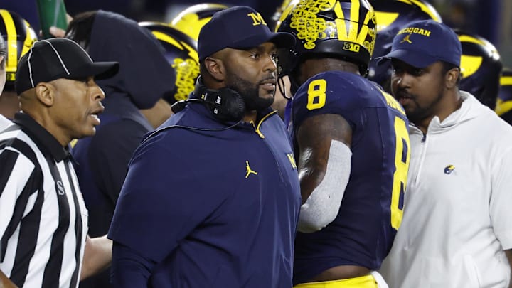 Aug 30, 2025; Ann Arbor, Michigan, USA;  Michigan Wolverines head coach Sherone Moore reacts on the sideline in the second half against the New Mexico Lobos at Michigan Stadium. Mandatory Credit: Rick Osentoski-Imagn Images