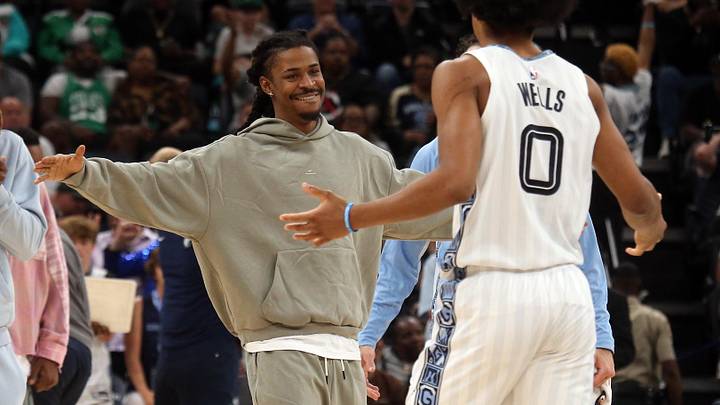 Mar 20, 2026; Memphis, Tennessee, USA; Memphis Grizzlies guard Ja Morant (left) reacts with forward Jaylen Wells (0) during a timeout during the fourth quarter against the Boston Celtics at FedExForum. Mandatory Credit: Petre Thomas-Imagn Images Mar 20, 2026; Memphis, Tennessee, USA; Memphis Grizzlies guard Ja Morant (left) reacts with forward Jaylen Wells (0) during a timeout during the fourth quarter against the Boston Celtics at FedExForum. Mandatory Credit: Petre Thomas-Imagn Images