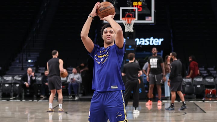 Mar 6, 2025; Brooklyn, New York, USA;  Golden State Warriors forward Trayce Jackson-Davis (32) warms up prior to the game against the Brooklyn Nets at Barclays Center. Mandatory Credit: Wendell Cruz-Imagn Images