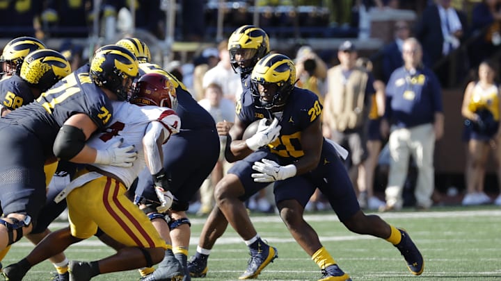 Sep 21, 2024; Ann Arbor, Michigan, USA; Michigan Wolverines running back Kalel Mullings (20) rushes in the first half against the USC Trojans at Michigan Stadium. Mandatory Credit: Rick Osentoski-Imagn Images Sep 21, 2024; Ann Arbor, Michigan, USA; Michigan Wolverines running back Kalel Mullings (20) rushes in the first half against the USC Trojans at Michigan Stadium. Mandatory Credit: Rick Osentoski-Imagn Images