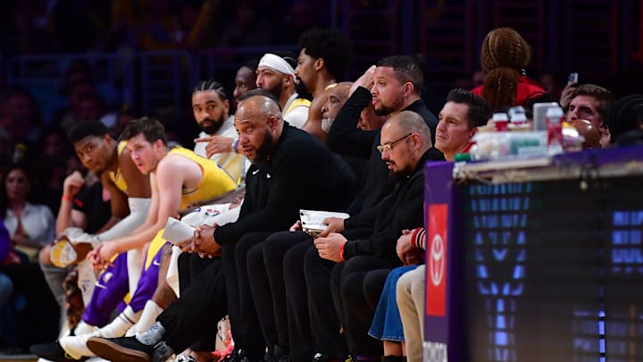 Mar 6, 2024; Los Angeles, California, USA; Los Angeles Lakers head coach Darvin Ham and the bench watch game action against the Sacramento Kings during the second half at Crypto.com Arena. Mandatory Credit: Gary A. Vasquez-Imagn Images
