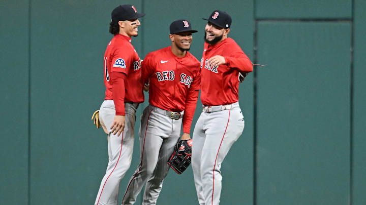 Apr 26, 2025; Cleveland, OH, USA; Boston Red Sox left fielder Jarren Duran (16) and center fielder Ceddanne Rafaela (3) and right fielder Wilyer Abreu (52) celebrate after the Red Sox beat the Cleveland Guardians at Progressive Field. Mandatory Credit: Ken Blaze-Imagn Images