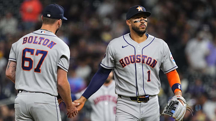 Apr 6, 2026; Denver, Colorado, USA; Houston Astros starting pitcher Cody Bolton (67) and third baseman Carlos Correa (1) in the fourth inning against the Colorado Rockies at Coors Field. Mandatory Credit: Ron Chenoy-Imagn Images
