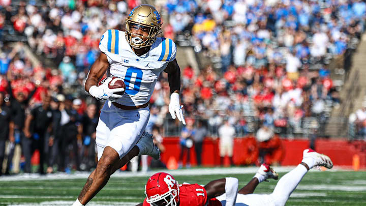 Oct 19, 2024; Piscataway, New Jersey, USA; UCLA Bruins running back Jalen Berger (0) catches a pass for a touchdown as Rutgers Scarlet Knights linebacker Abram Wright (11) pursues during the second half at SHI Stadium. Mandatory Credit: Vincent Carchietta-Imagn Images Oct 19, 2024; Piscataway, New Jersey, USA; UCLA Bruins running back Jalen Berger (0) catches a pass for a touchdown as Rutgers Scarlet Knights linebacker Abram Wright (11) pursues during the second half at SHI Stadium. Mandatory Credit: Vincent Carchietta-Imagn Images