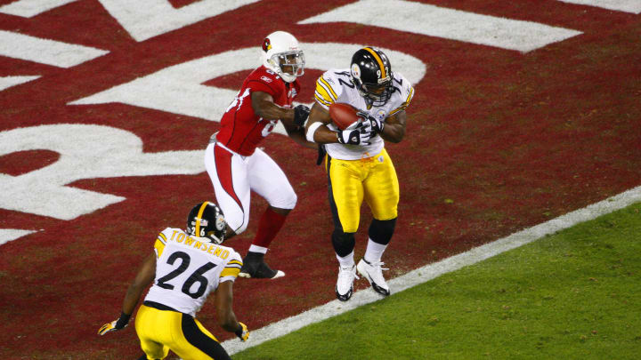 Feb 1, 2009; Tampa, FL, USA; Pittsburgh Steelers linebacker James Harrison (92) intercepts the ball for a touchdown in front of Arizona Cardinals wide receiver Anquan Boldin (81) during the second quarter of Super Bowl XLIII at Raymond James Stadium. Mandatory Credit: Kim Klement-USA TODAY Sports Feb 1, 2009; Tampa, FL, USA; Pittsburgh Steelers linebacker James Harrison (92) intercepts the ball for a touchdown in front of Arizona Cardinals wide receiver Anquan Boldin (81) during the second quarter of Super Bowl XLIII at Raymond James Stadium. Mandatory Credit: Kim Klement-USA TODAY Sports