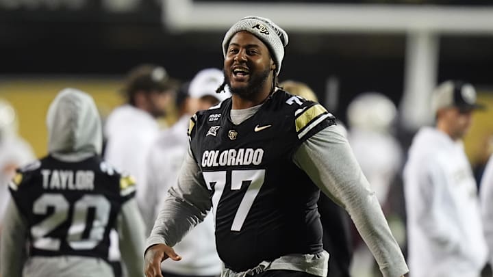 Colorado Buffaloes offensive lineman Jordan Seaton (77) before the game against the Arizona State Sun Devils at Folsom Field. Mandatory Credit: Ron Chenoy-Imagn Images