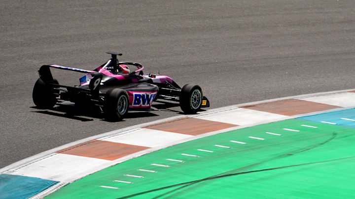 May 4, 2024; Miami Gardens, Florida, USA; F1 Academy driver Abbi Pulling (9) races into turn five during the F1 Academy First Race at Miami International Autodrome. Mandatory Credit: John David Mercer-USA TODAY Sports
