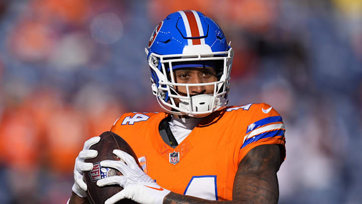 Jan 5, 2025; Denver, Colorado, USA; Denver Broncos wide receiver Courtland Sutton (14) before the game against the Kansas City Chiefs at Empower Field at Mile High. Mandatory Credit: Ron Chenoy-Imagn Images