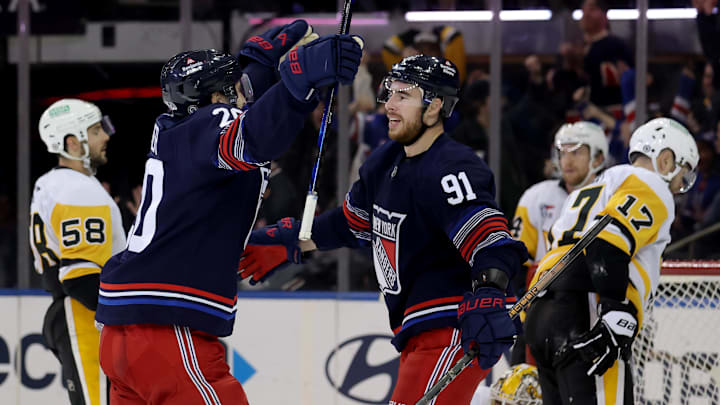 Dec 6, 2024; New York, New York, USA; New York Rangers right wing Reilly Smith (91) celebrates his goal against the Pittsburgh Penguins with left wing Chris Kreider (20) during the third period at Madison Square Garden. Mandatory Credit: Brad Penner-Imagn Images