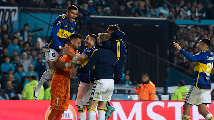 Faustino Marcos Rojo (L) and goalkeeper Sergio Romero of...