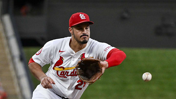 Sep 16, 2024; St. Louis, Missouri, USA;  St. Louis Cardinals third baseman Nolan Arenado (28) fields a ground ball against the Pittsburgh Pirates during the first inning at Busch Stadium. Mandatory Credit: Jeff Curry-Imagn Images