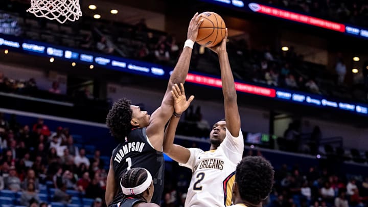 Dec 26, 2024; New Orleans, Louisiana, USA; Houston Rockets forward Amen Thompson (1) blocks the shot of New Orleans Pelicans forward Herbert Jones (2) during the second half at Smoothie King Center. Mandatory Credit: Stephen Lew-Imagn Images Dec 26, 2024; New Orleans, Louisiana, USA; Houston Rockets forward Amen Thompson (1) blocks the shot of New Orleans Pelicans forward Herbert Jones (2) during the second half at Smoothie King Center. Mandatory Credit: Stephen Lew-Imagn Images