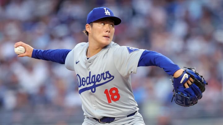 Jun 7, 2024; Bronx, New York, USA; Los Angeles Dodgers starting pitcher Yoshinobu Yamamoto (18) pitches against the New York Yankees during the second inning at Yankee Stadium.