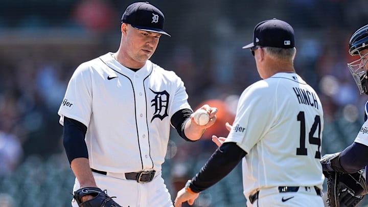Detroit Tigers pitcher Tarik Skubal (29) hands the ball to manager A.J. Hinch (14) for a pitching change. 