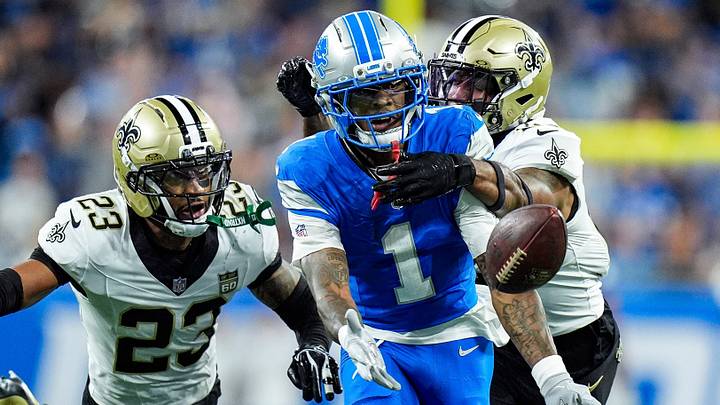 Detroit Lions wide receiver Jameson Williams (1) misses a catch against New Orleans Saints safety Julian Blackmon (23) and safety Justin Reid (21) during the first half at Ford Field in Detroit on Sunday, Sept. 13, 2026. Detroit Lions wide receiver Jameson Williams (1) misses a catch against New Orleans Saints safety Julian Blackmon (23) and safety Justin Reid (21) during the first half at Ford Field in Detroit on Sunday, Sept. 13, 2026.