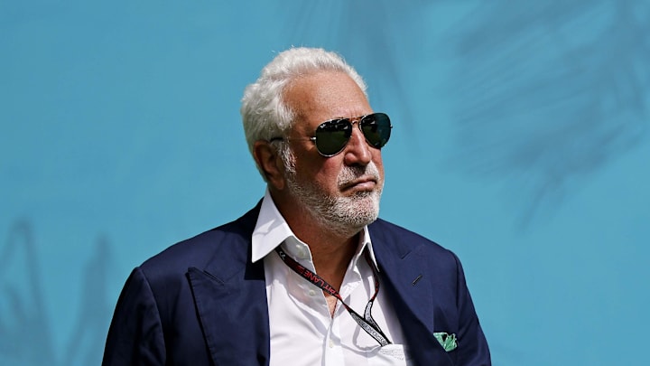 May 5, 2024; Miami Gardens, Florida, USA; Aston Martin executive chairman Lawrence Stroll walks into the F1 Village before the F1 Miami Grand Prix at Miami International Autodrome. Mandatory Credit: Peter Casey-Imagn Images
