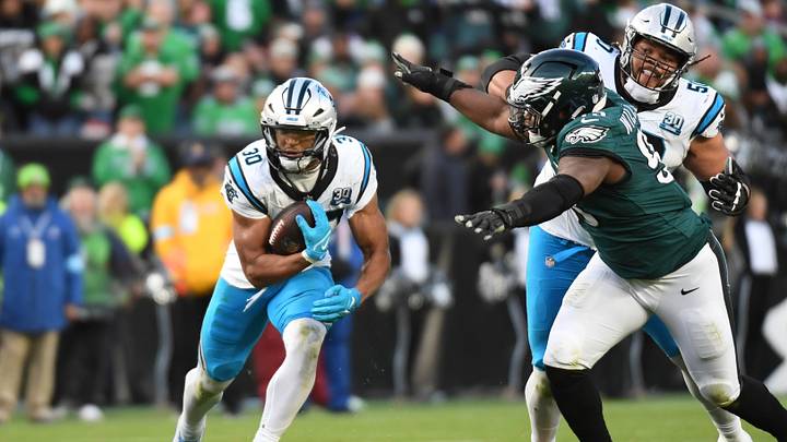 Carolina Panthers running back Chuba Hubbard (30) past Philadelphia Eagles defensive tackle Milton Williams