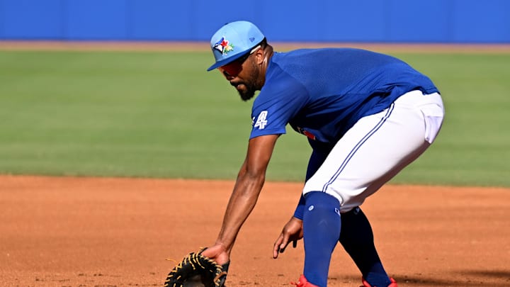 Feb 19, 2026; Dunedin, FL, USA; Toronto Blue Jays infielder Eloy Jimenez (74) fields a ground ball  during spring training at Bobby Mattick Training Center at Englebert Complex. Mandatory Credit: Jonathan Dyer-Imagn Images