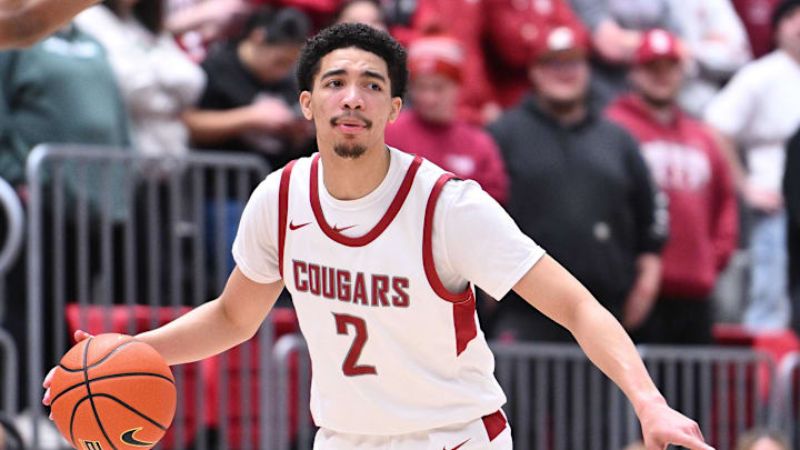 Feb 15, 2024; Pullman, Washington, USA; Washington State Cougars guard Myles Rice (2) controls the